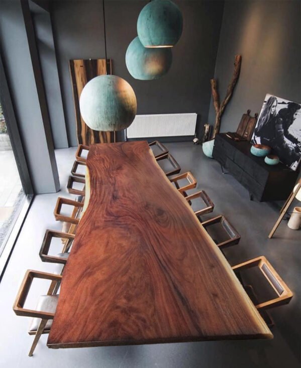 A magnificent 350 cm long Suar wood tabletop with a unique slab featuring an organic trunk shape.