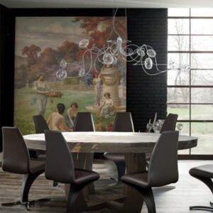 Elegant round table made from recycled teak, featuring unique curved legs.